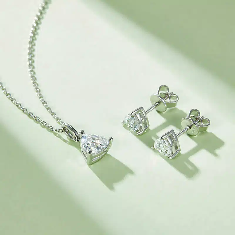classic trillion cut moissanite solitaire earrings 03
