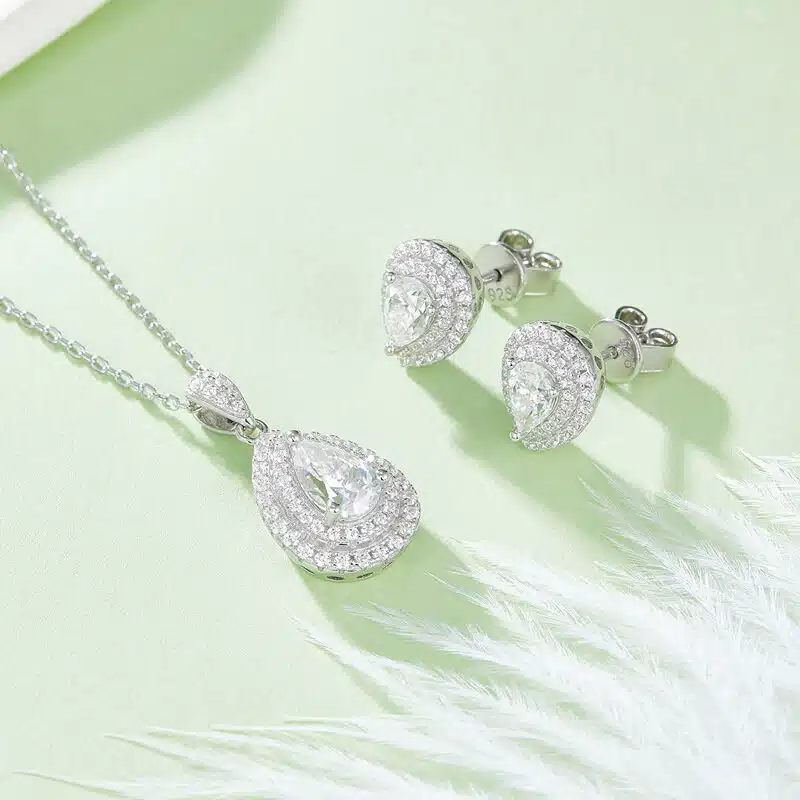 luxury halo setting pear cut moissanite earrings 03