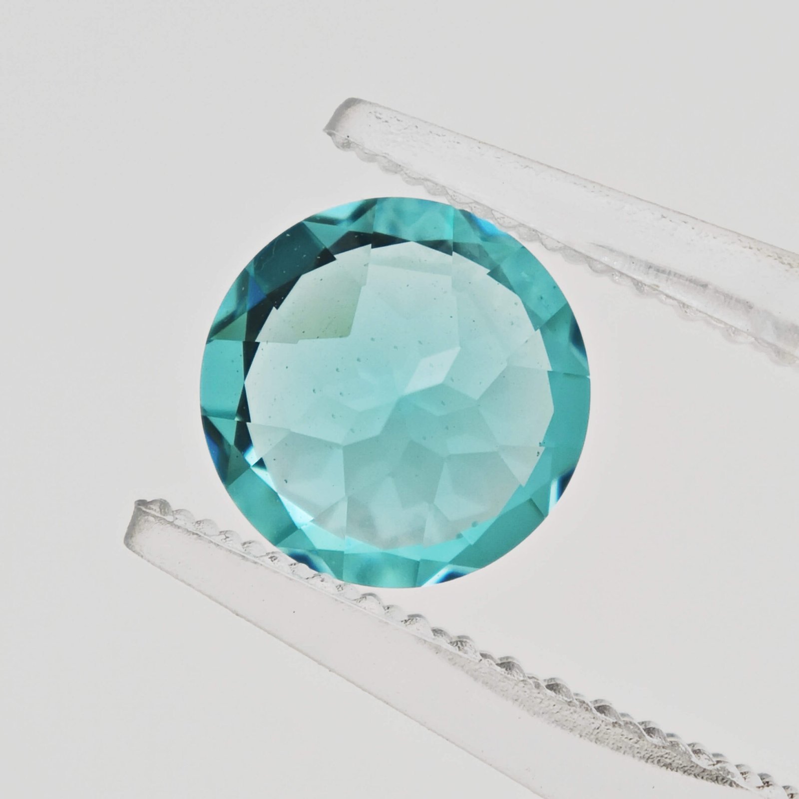 Round cut lab grown Paraiba YAG 02 Round cut lab grown Paraiba YAG 02