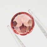 zaffiro Padparadscha 02, taglio brillante rotondo, coltivato in laboratorio