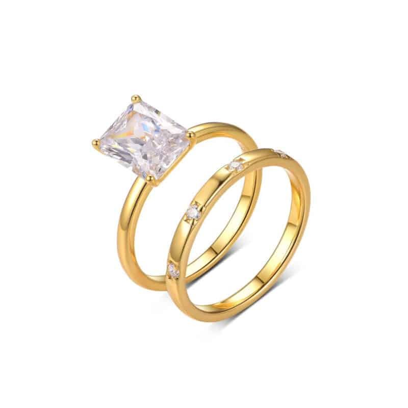 9x7mm emerald cut moissanite engagement ring set nw48m 01