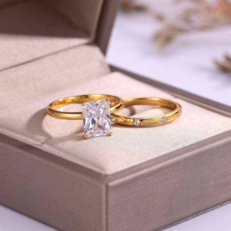 9x7mm emerald cut moissanite engagement ring set nw48m 02