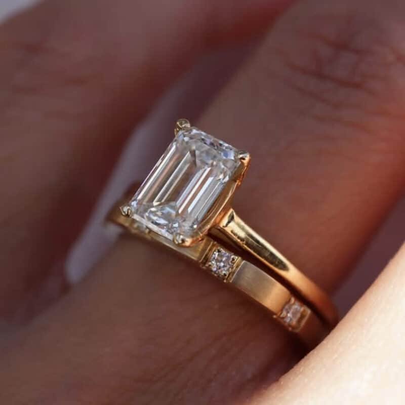 9x7mm emerald cut moissanite engagement ring set nw48m 03