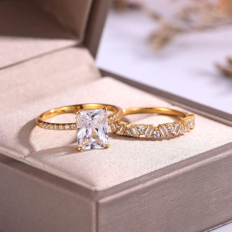 9x7mm emerald cut moissanite engagement ring set nw49m 02