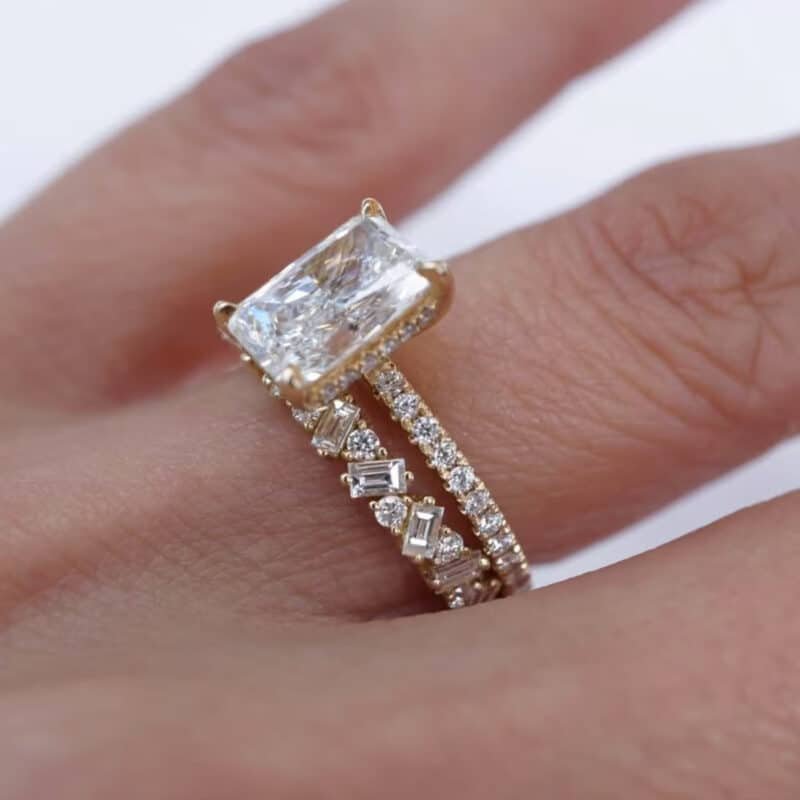 9x7mm emerald cut moissanite engagement ring set nw49m 03