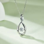 Sterling Silver Dancing Moissanite Pendant Necklace 3 sterling silver white gold plated dancing moissanite pendant necklace oldo925w-00 04