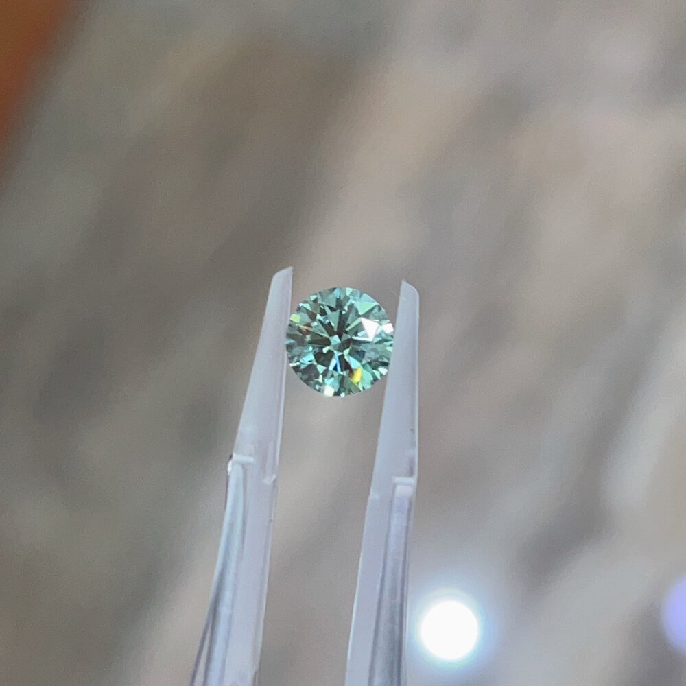 1.01 carat round brilliant cut lab grown green diamond 1.01 carat round brilliant cut lab grown green diamond