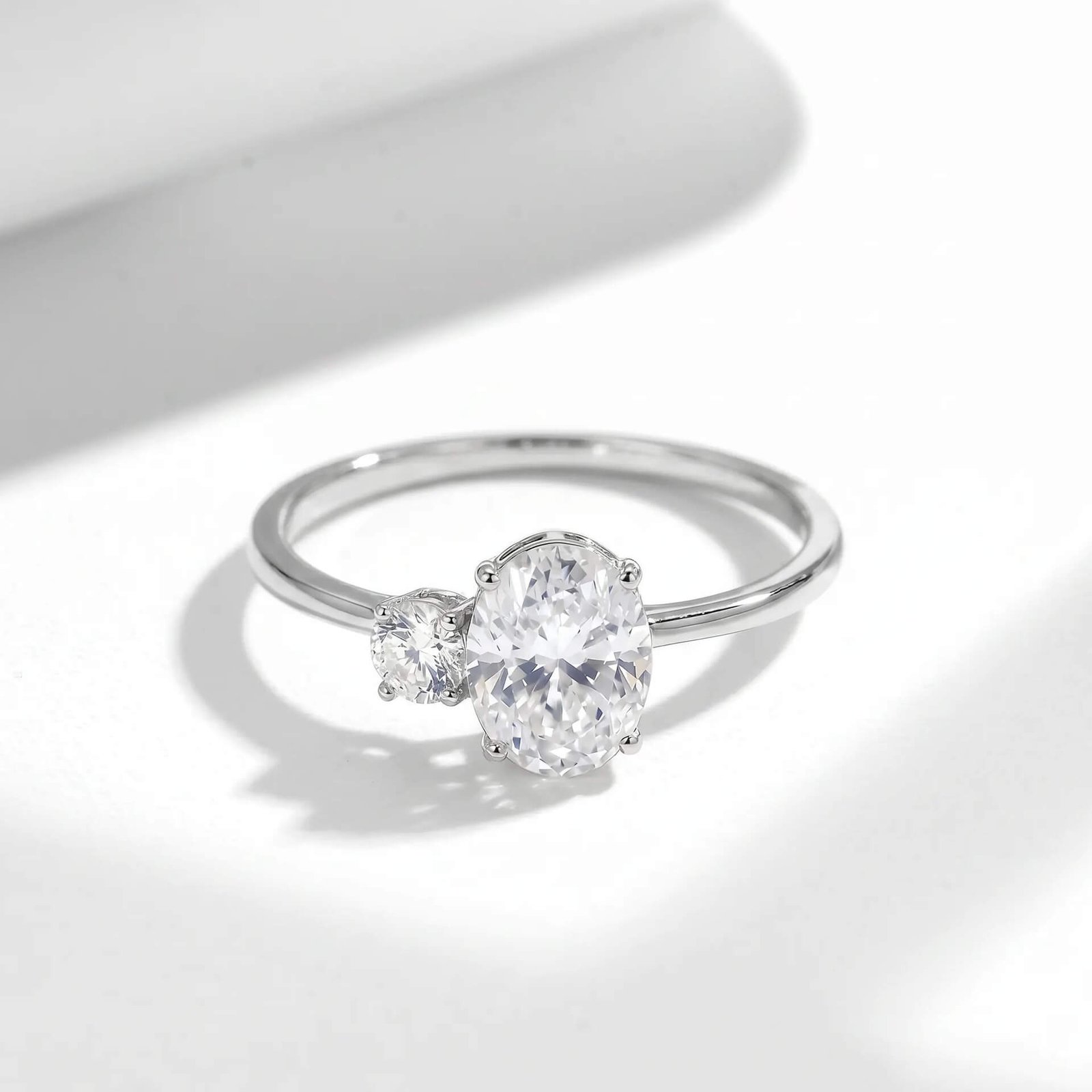 Oval and round two stone moissanite engagement ring Oval and round two stone moissanite engagement ring