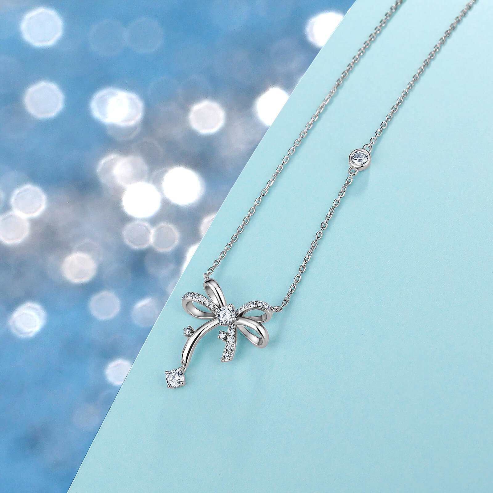Collana con pendente a fiocco scintillante in moissanite Collana con pendente a fiocco scintillante in moissanite