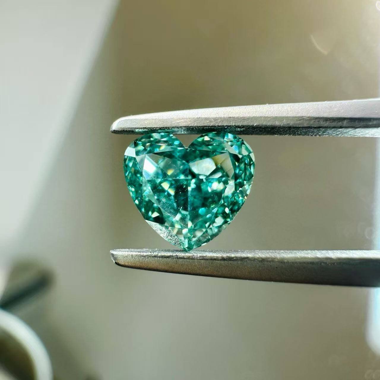 1.01ct heart cut fancy intense green lab grown diamond