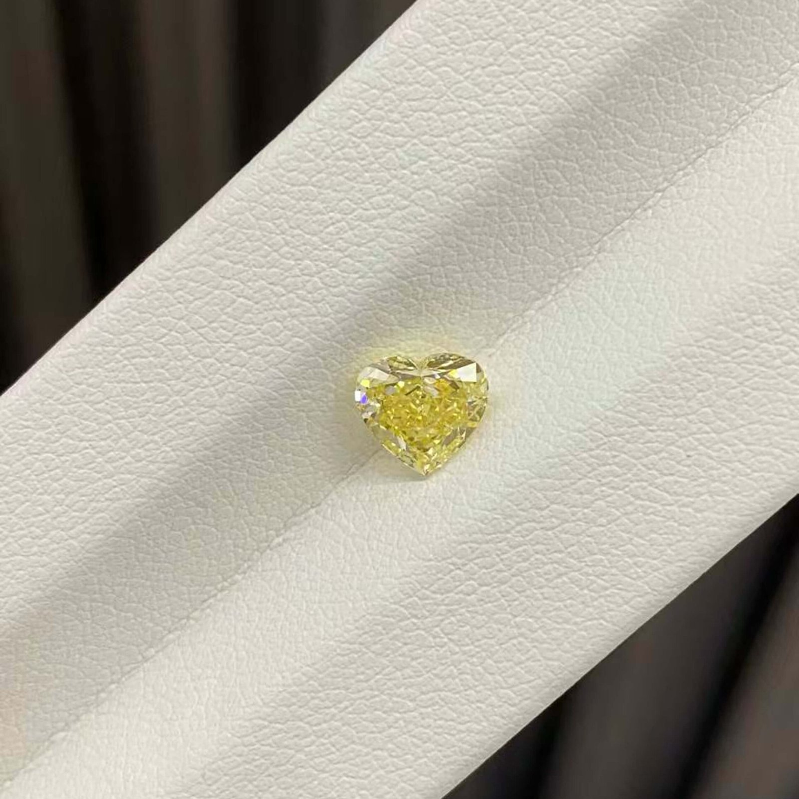 1.06ct heart cut fancy intense yellow lab grown diamond