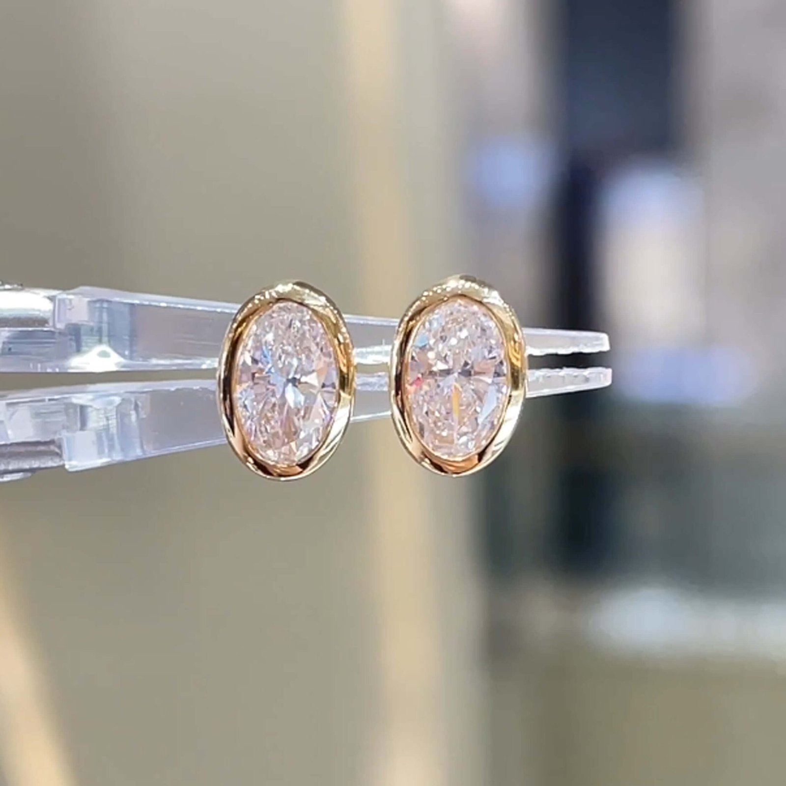 Bezel setting oval cut lab grown diamond bubble earrings stud
