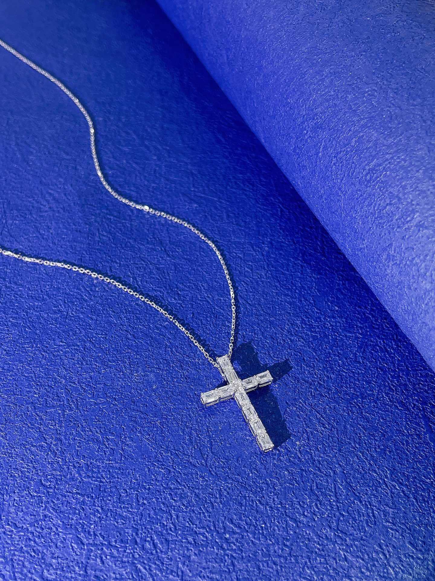 Emerald cut lab grown diamond cross pendant necklace Emerald cut lab grown diamond cross pendant necklace