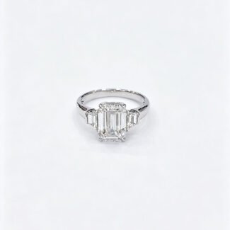 Emerald cut lab grown diamond three stones engagement ring