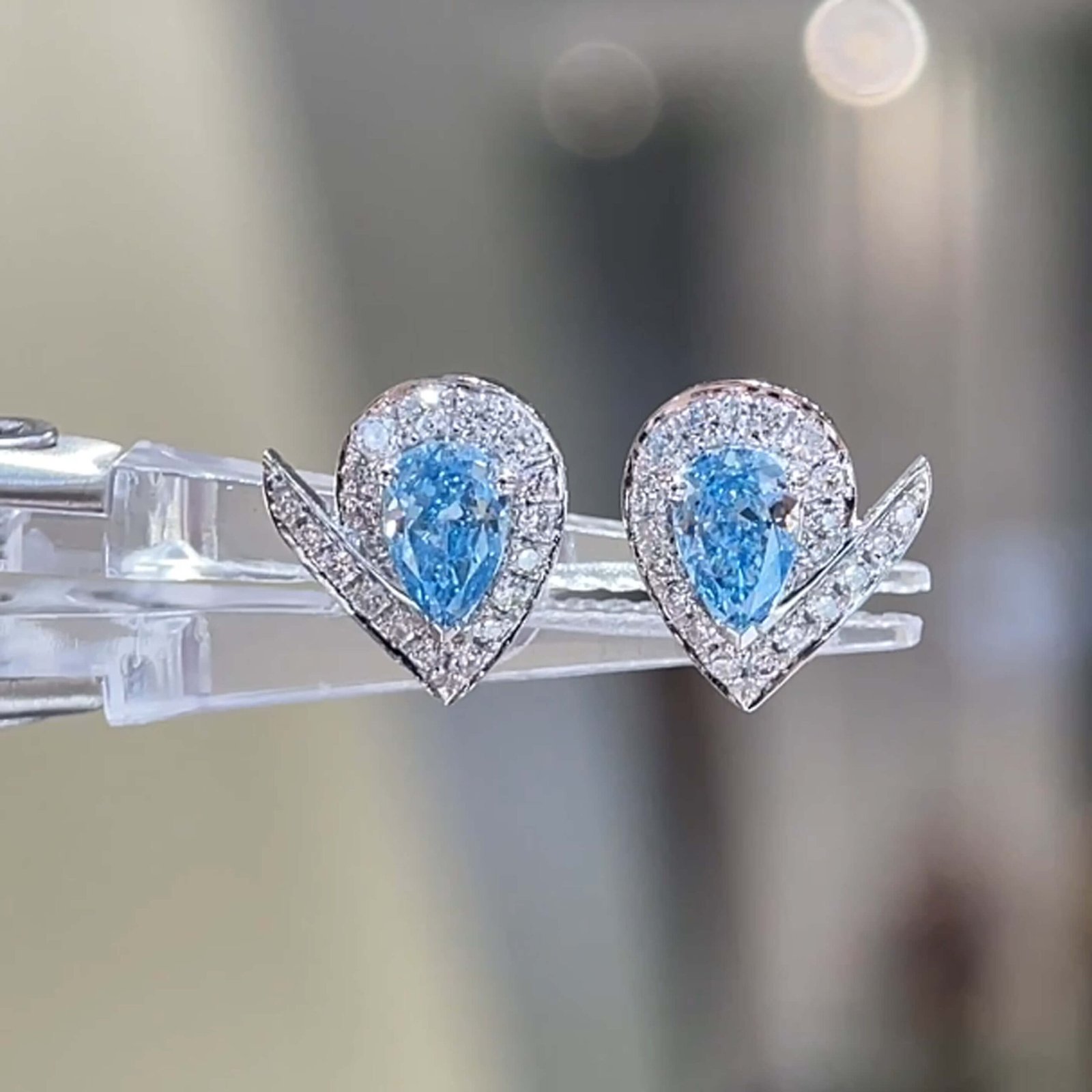 Halo setting pear cut lab grown blue diamond earrings stud Halo setting pear cut lab grown blue diamond earrings stud