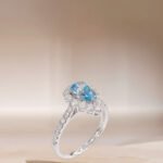 Halo setting pear cut lab grown blue diamond engagment ring