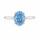 Oval cut lab grown blue diamond engagement ring