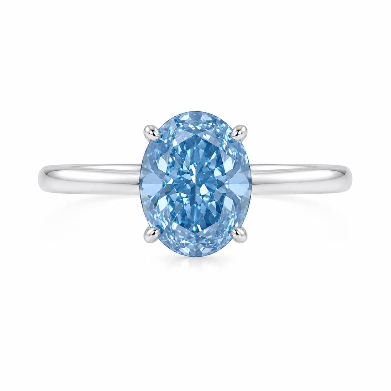 Ovaal geslepen, in het laboratorium gekweekte blauwe diamanten verlovingsring