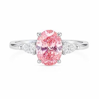 Oval cut lab grown pink diamond three stones engagement ring