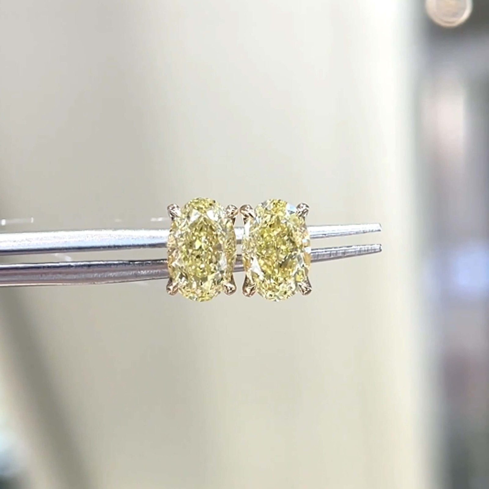 Oval cut lab grown yellow diamond earrings stud