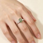 Pear cut lab grown diamond three stones engagement ring