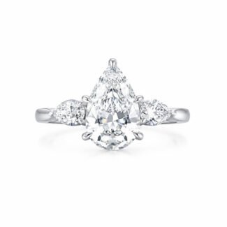 Pear cut lab grown diamond three stones engagement ring