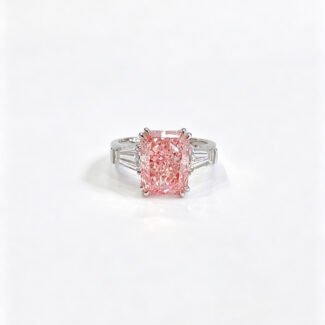Radiant cut lab grown pink diamond three stones engagement ring