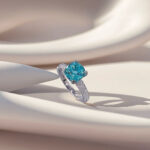 Cushion cut lab grown Paraiba engagement ring