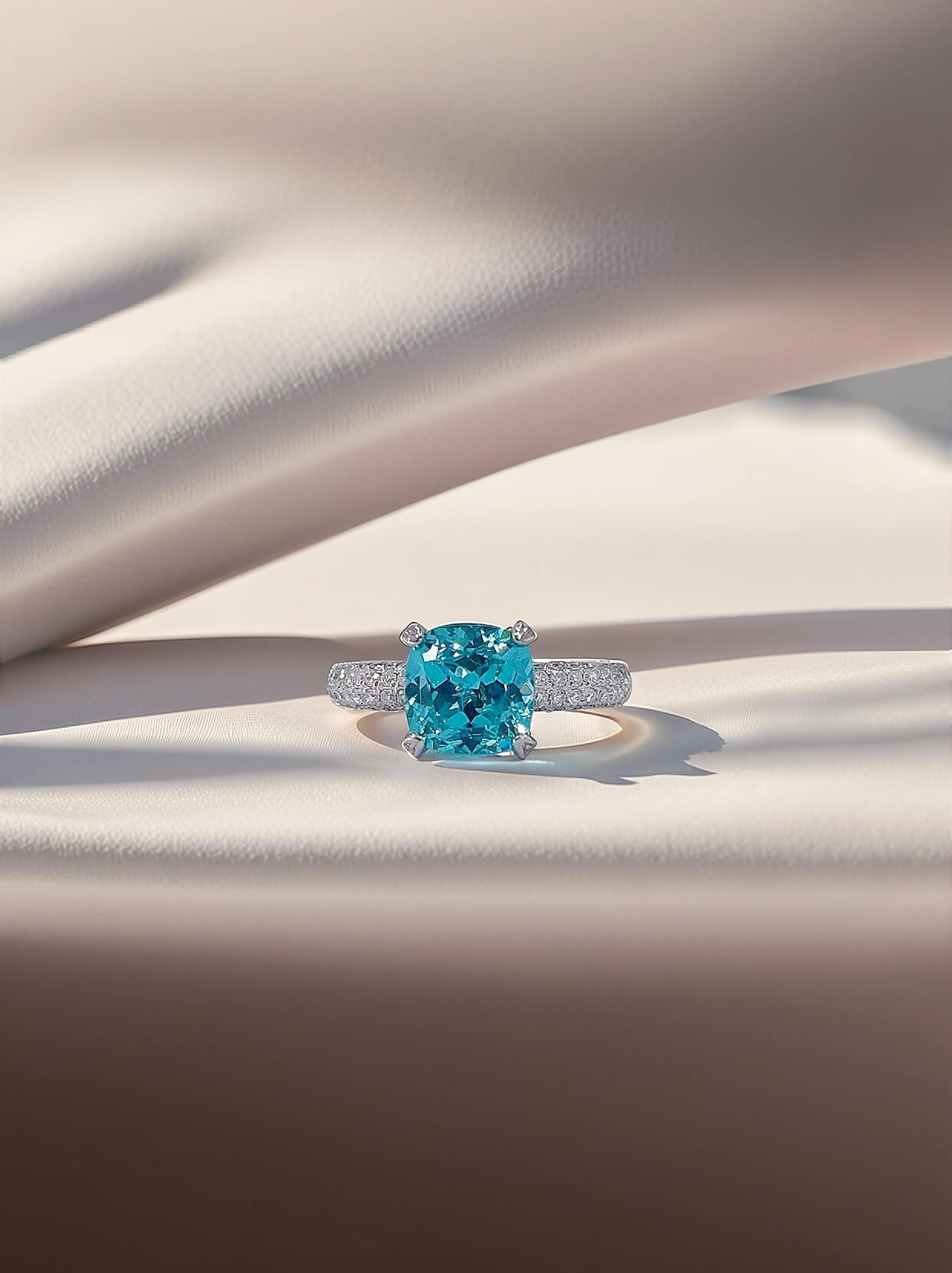 Cushion cut lab grown Paraiba engagement ring