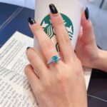 Cushion cut lab grown Paraiba engagement ring