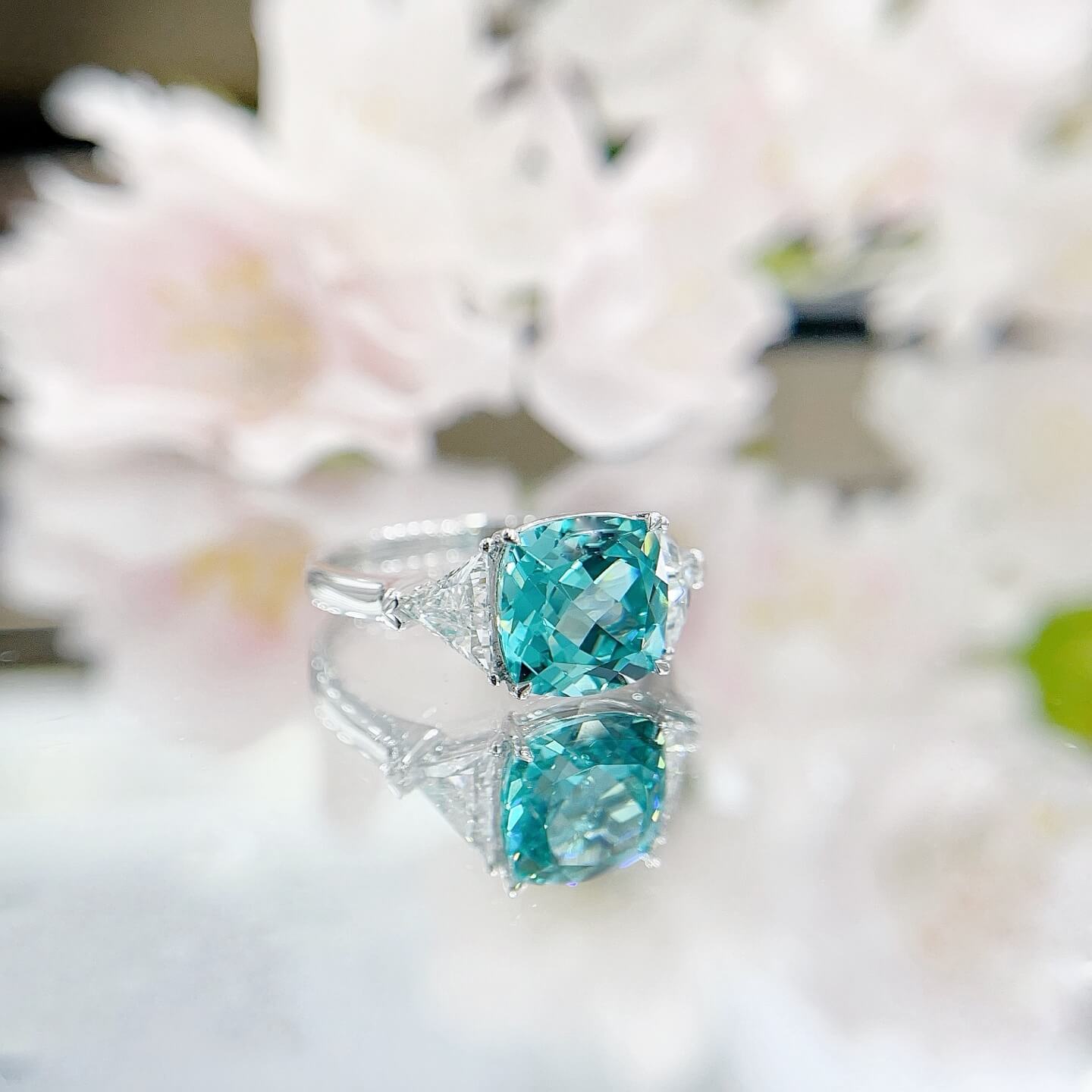 Cushion cut lab grown Paraiba three stones engagement ring