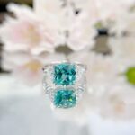 Cushion cut lab grown Paraiba three stones engagement ring