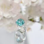 Cushion cut lab grown Paraiba three stones engagement ring