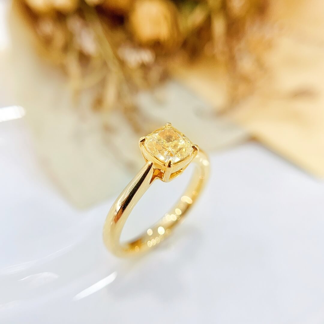 Cushion cut lab grown yellow diamond engagement ring