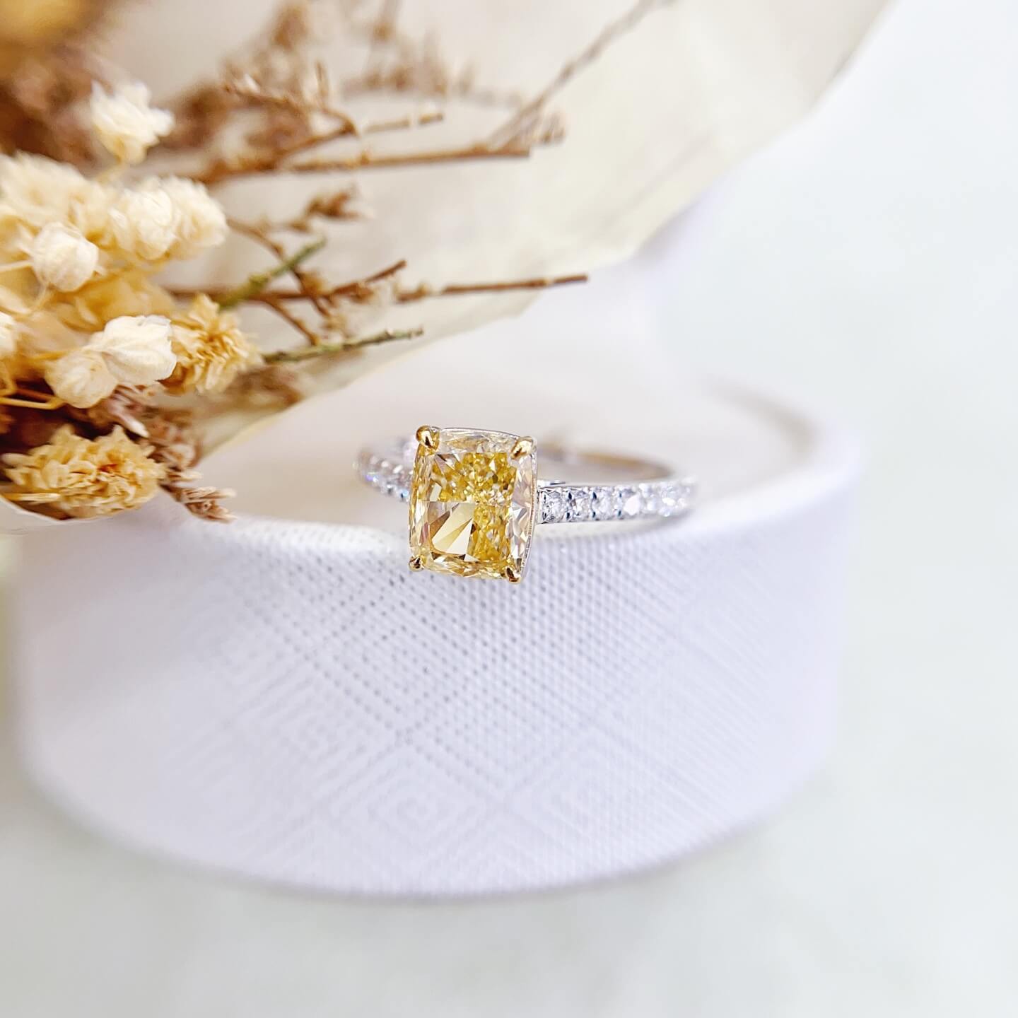 Cushion cut lab grown yellow diamond engagement ring