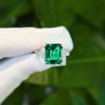 Emerald cut lab grown emerald three stones engagement ring 02