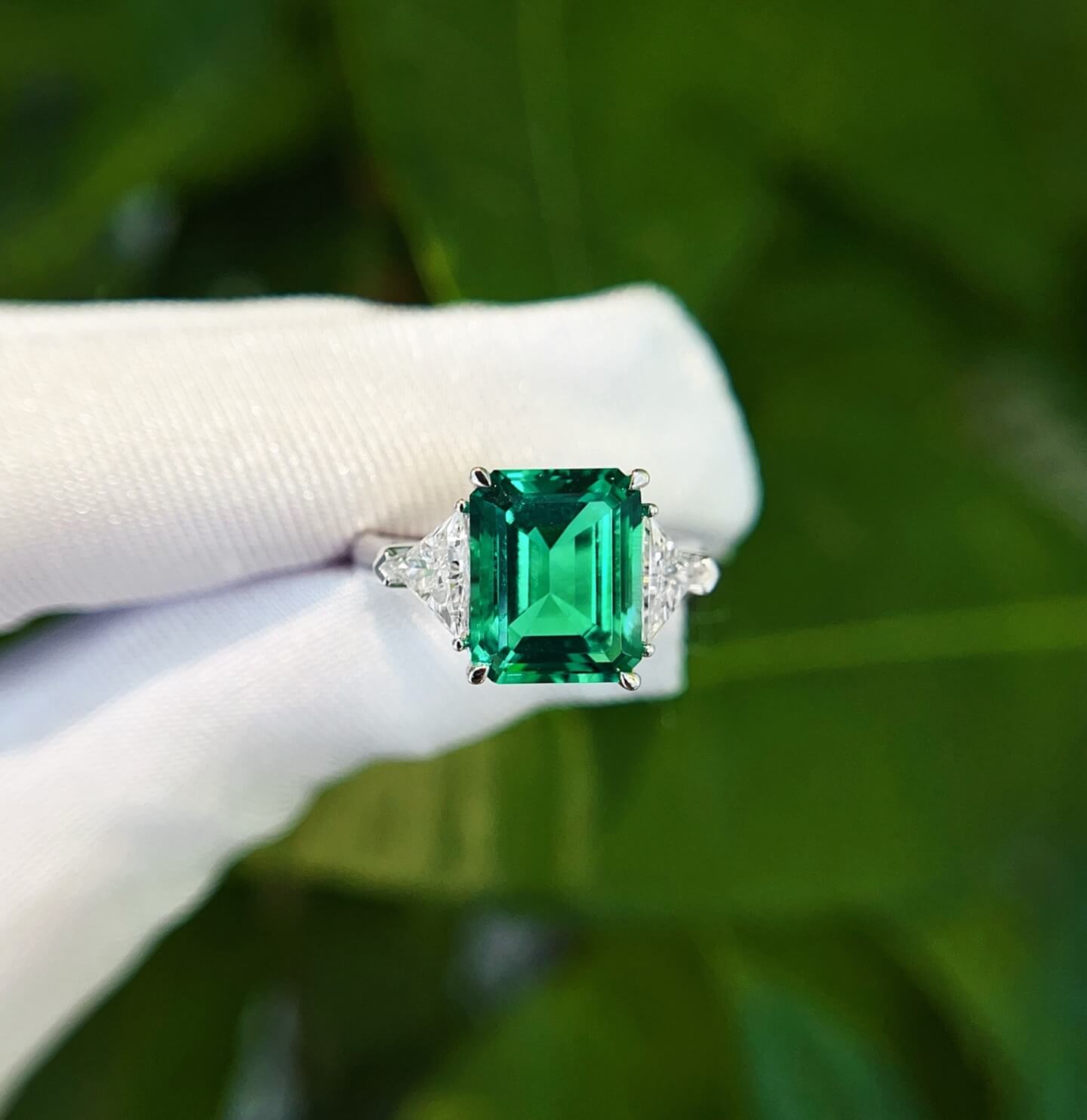 Emerald cut lab grown emerald three stones engagement ring 02