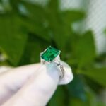 Emerald cut lab grown emerald three stones engagement ring 02