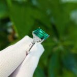 Emerald cut lab grown emerald three stones engagement ring 02
