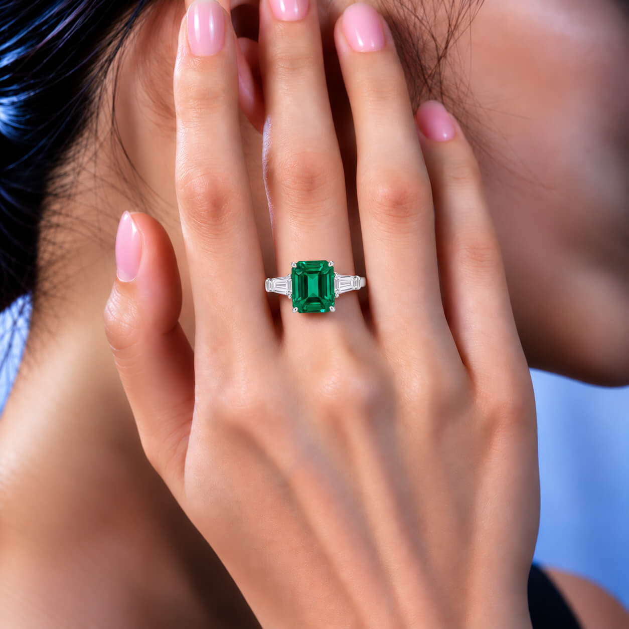 Emerald cut lab grown emerald three stones engagement ring 01