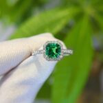 Halo setting asscher cut lab grown emerald engagement ring