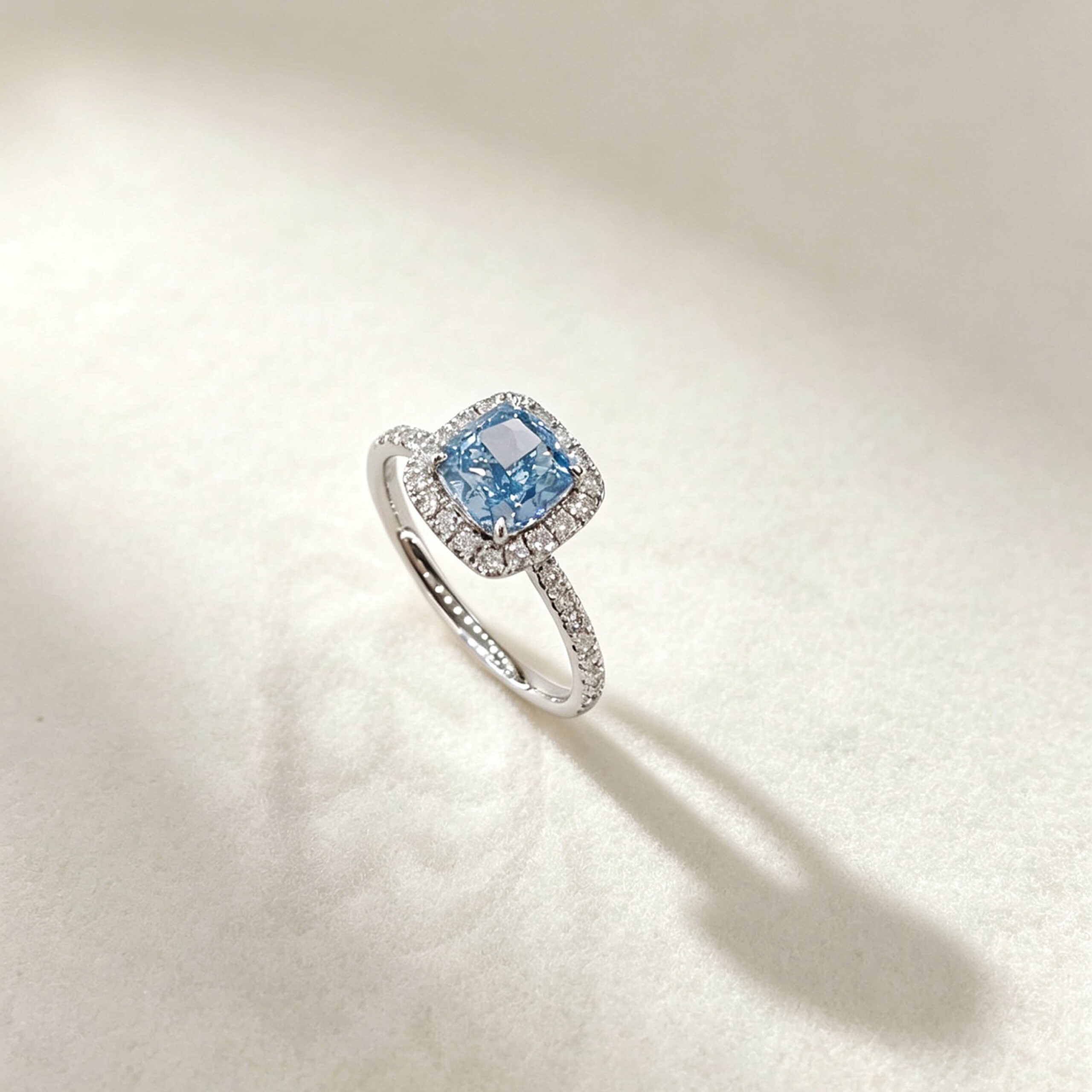 Halo setting cushion cut lab grown blue diamond engagement ring Halo setting cushion cut lab grown blue diamond engagement ring