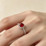 Halo setting cushion cut lab grown ruby engagement ring