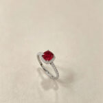 Halo setting cushion cut lab grown ruby engagement ring