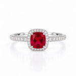 Halo setting cushion cut lab grown ruby engagement ring
