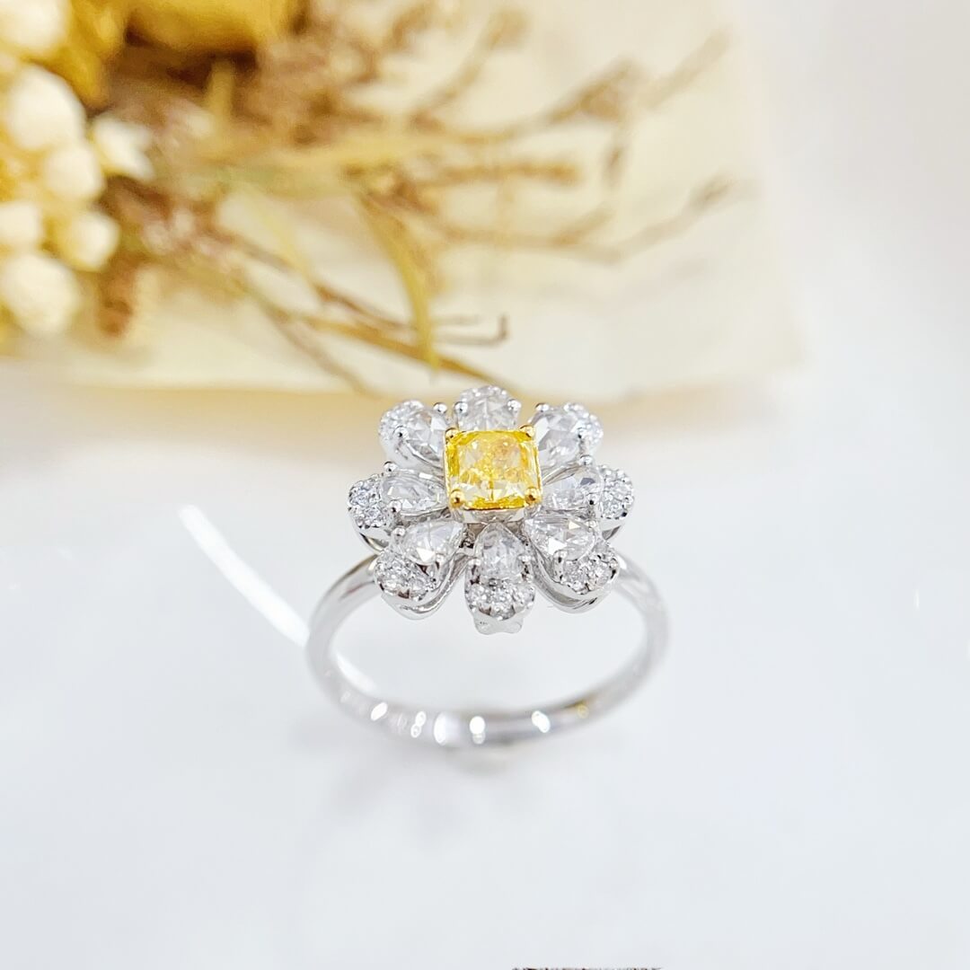 Halo setting cushion cut lab grown yellow diamond engagement ring