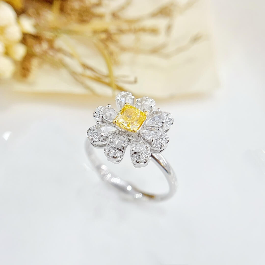 Halo setting cushion cut lab grown yellow diamond engagement ring