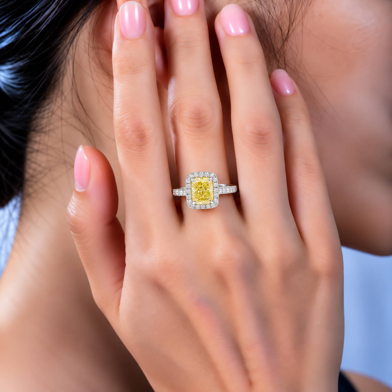 Halo setting cushion cut lab grown yellow diamond engagement ring