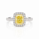Halo setting cushion cut lab grown yellow diamond engagement ring