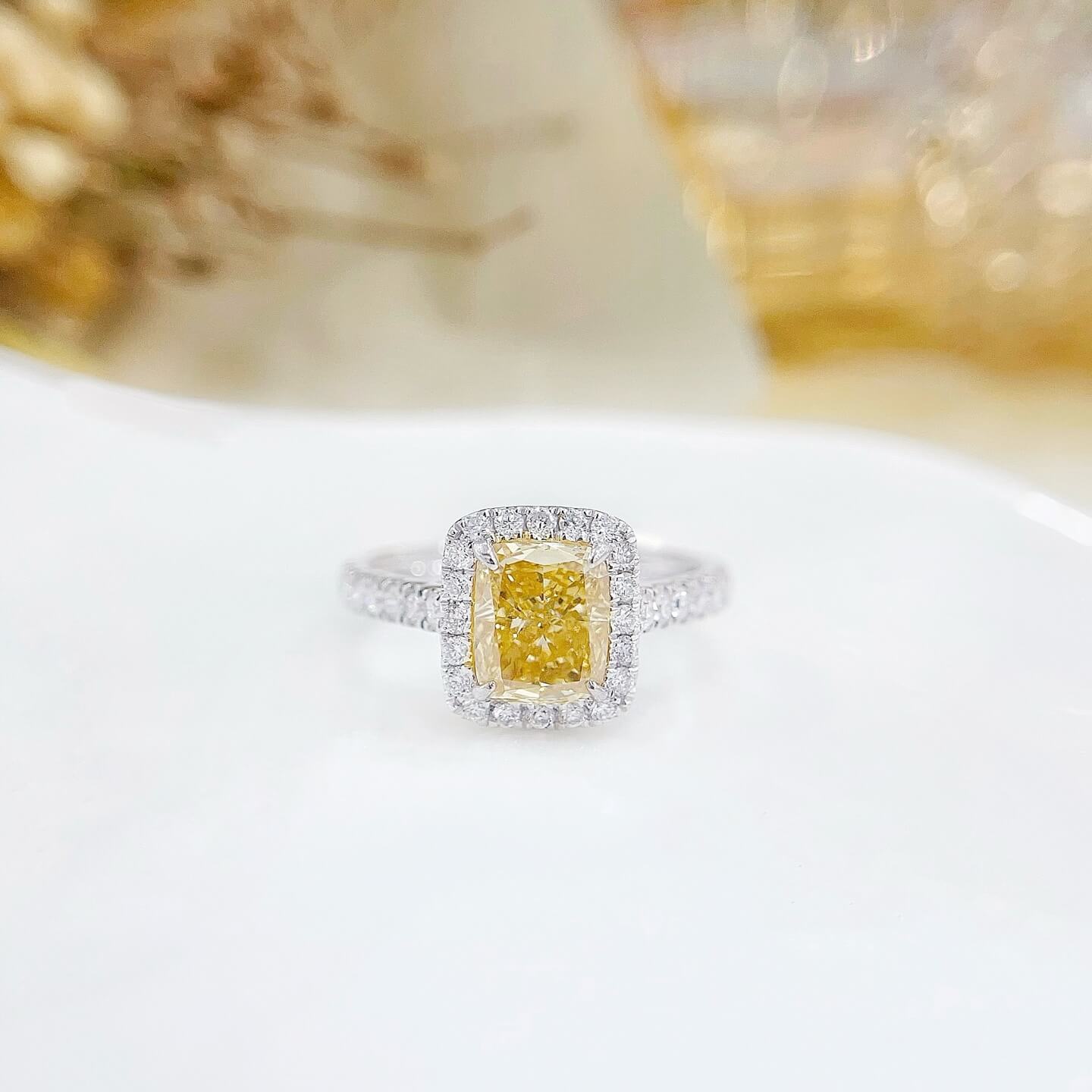Halo setting cushion cut lab grown yellow diamond engagement ring